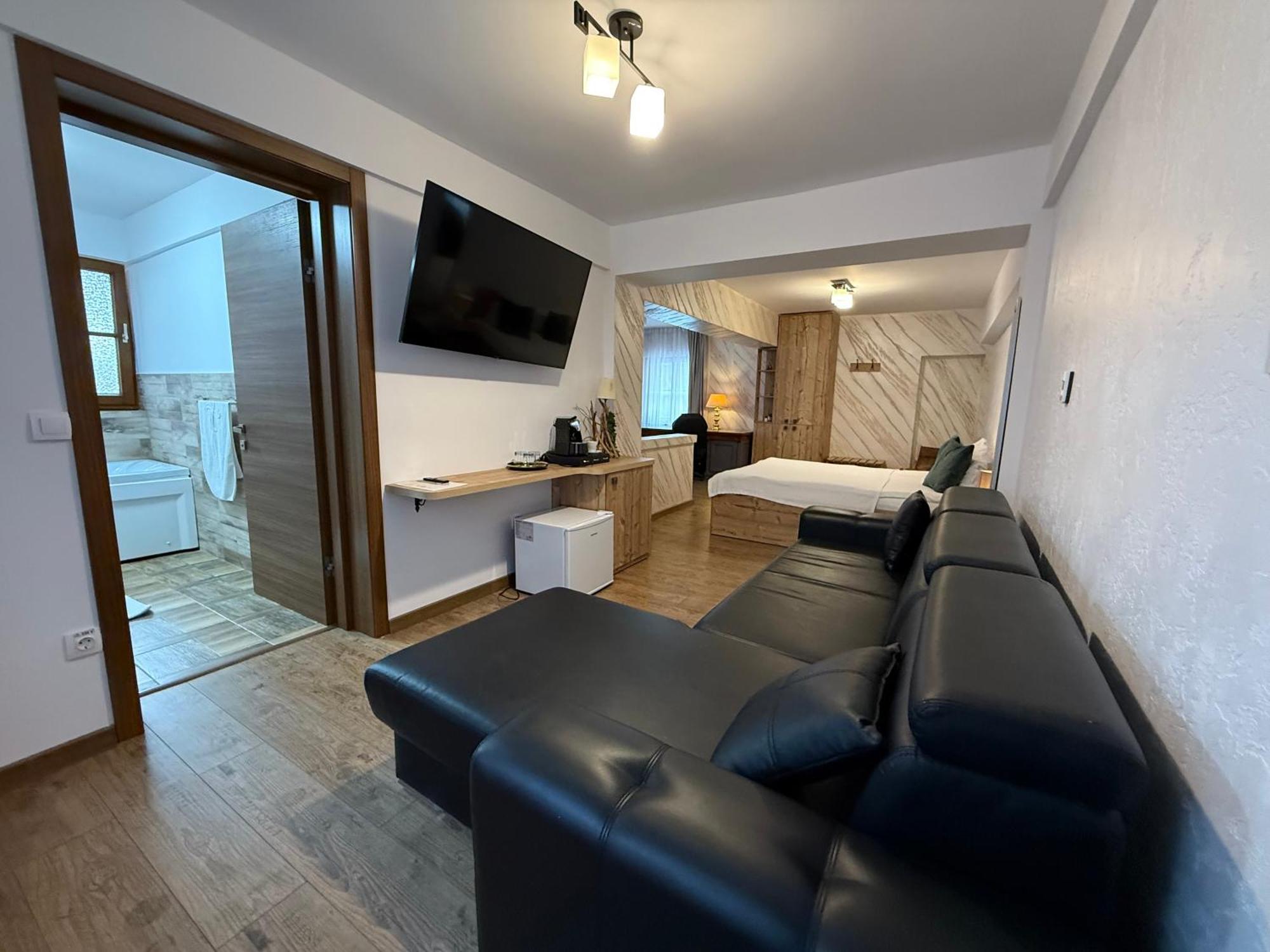 Conacul Radacinilor Hotell Petroşani Exteriör bild